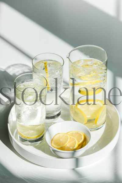 Vertical stock photo of tray with jar and glasses