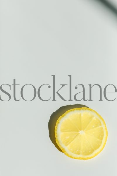 Vertical stock photo of lemon slice