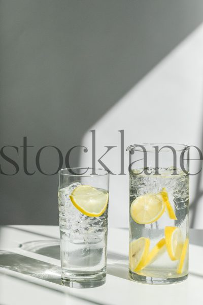 Vertical stock photo of water with lemons