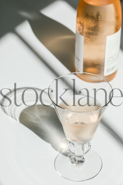 Vertical stock photo of rose wine