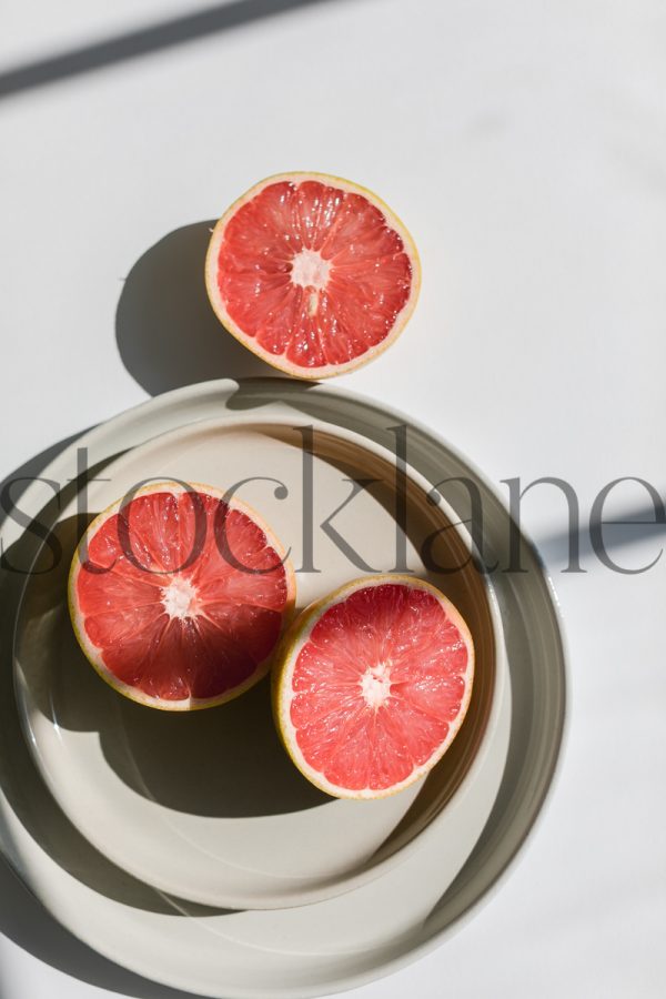 Vertical stock photo of grapefruit