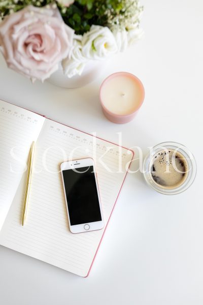 Vertical stock photo of feminine desktop