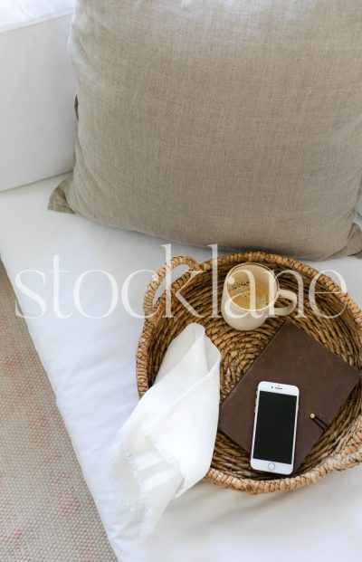 Vertical stock photo of coffee tray on couch