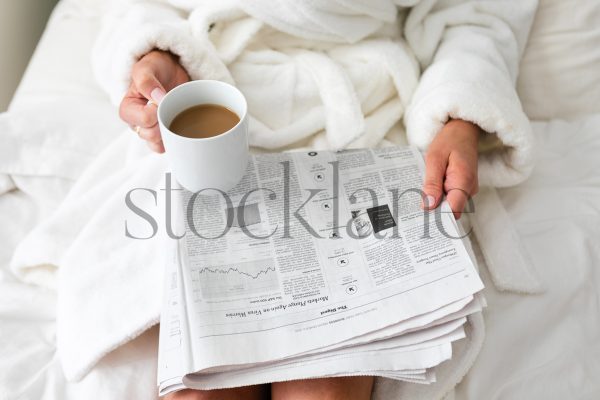 Horizontal stock photo of woman having breakfast in bed