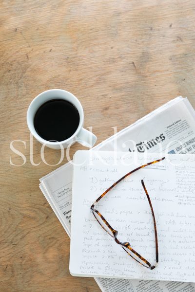 Vertical stock photo of desktop with coffee