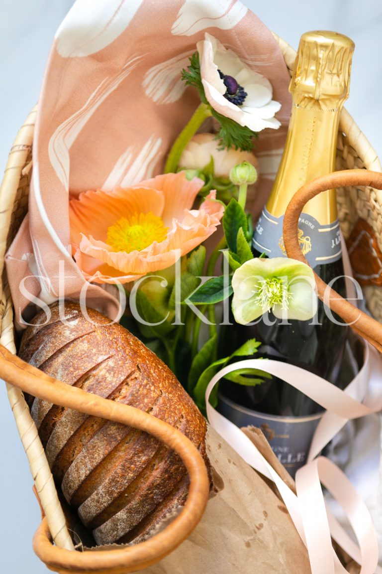 Vertical stock photo of spring picnic basket