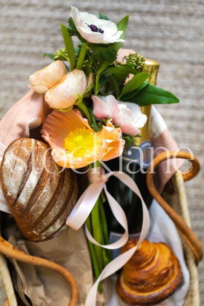 Vertical stock photo of spring picnic basket