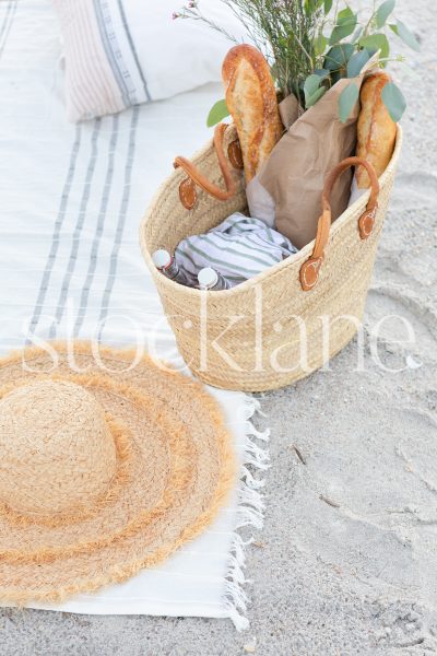 Vertical stock photo of picnic basket.