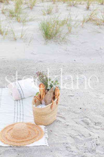 Vertical stock photo of picnic basket.