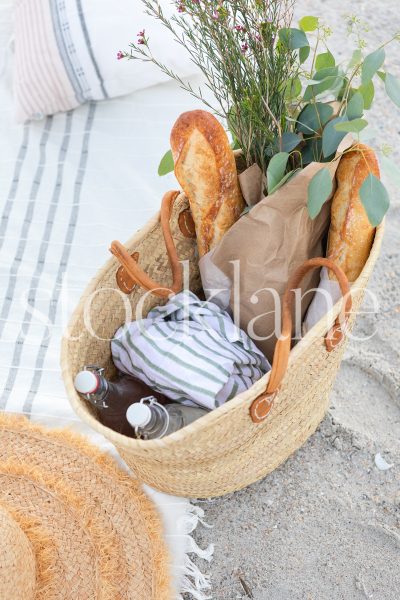 Vertical stock photo of picnic basket.