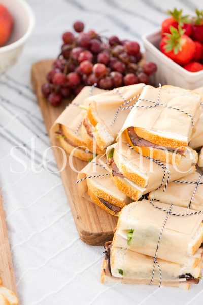 Vertical stock photo of summer beach picnic.