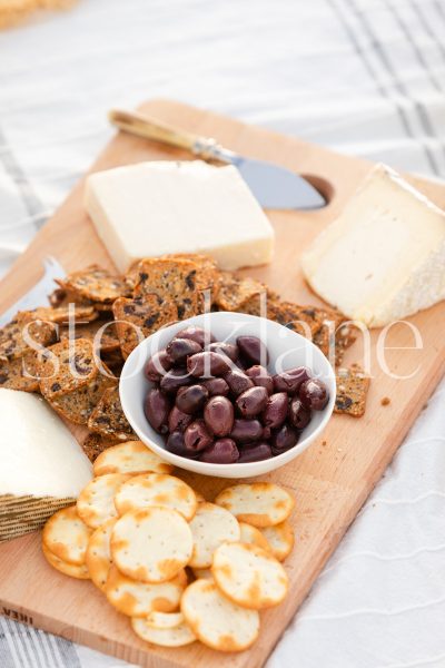 Vertical stock photo of summer beach picnic.