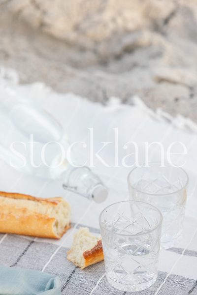 Vertical stock photo of summer beach picnic.