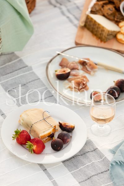 Vertical stock photo of summer beach picnic.