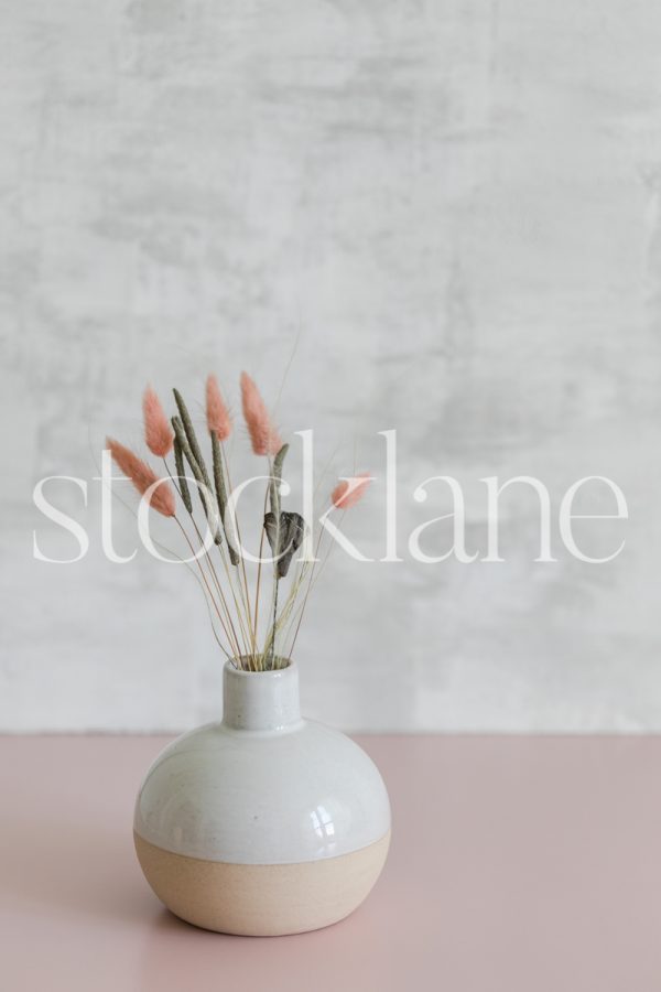 Vertical stock photo of a dried fall florals.