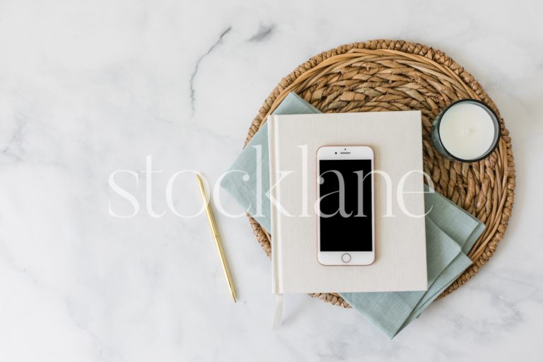 Horizontal stock photo of a flat lay with an iPhone