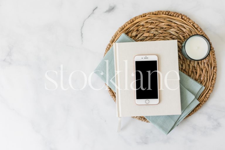 Horizontal stock photo of a flat lay with an iPhone