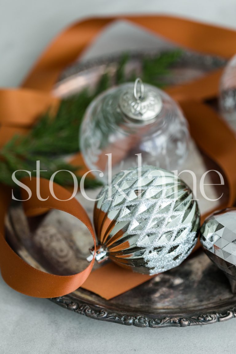 Vertical stock photo of Christmas ornaments.