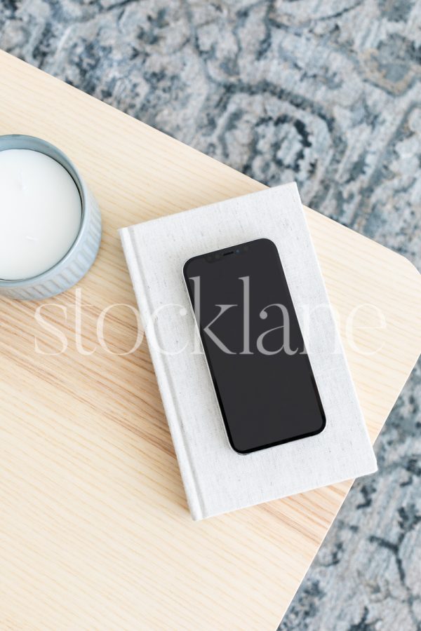 Vertical stock photo of an iPhone mockup overview