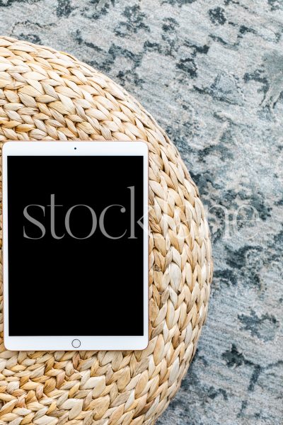 Vertical stock photo of an iPad.