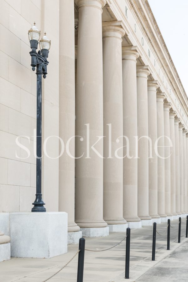 Vertical stock photo of a classic building with columns.