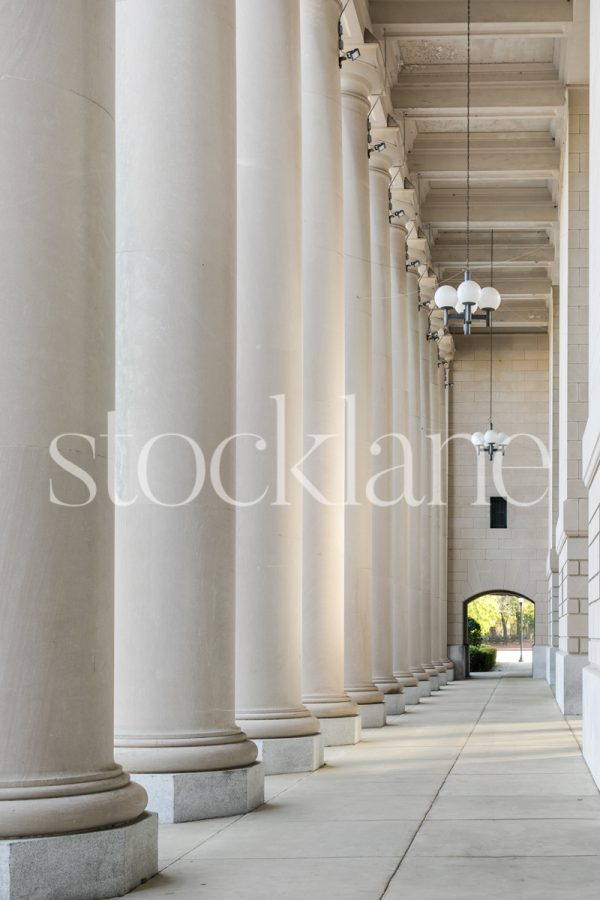 Vertical stock photo of a classic building with columns.